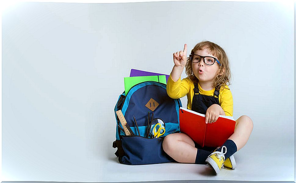 Child reading one of the stories to learn to add.