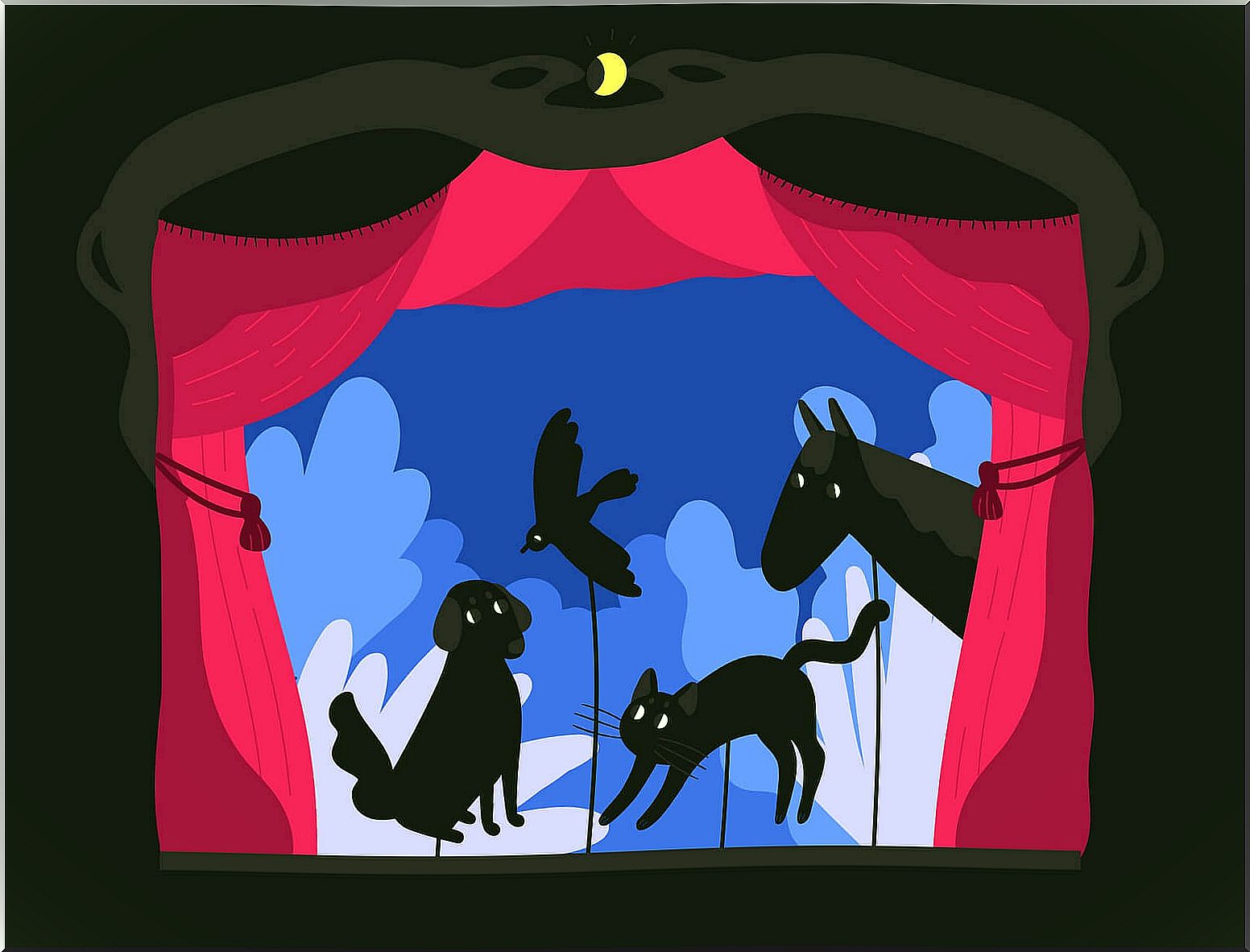 Animals in homemade shadow theater.