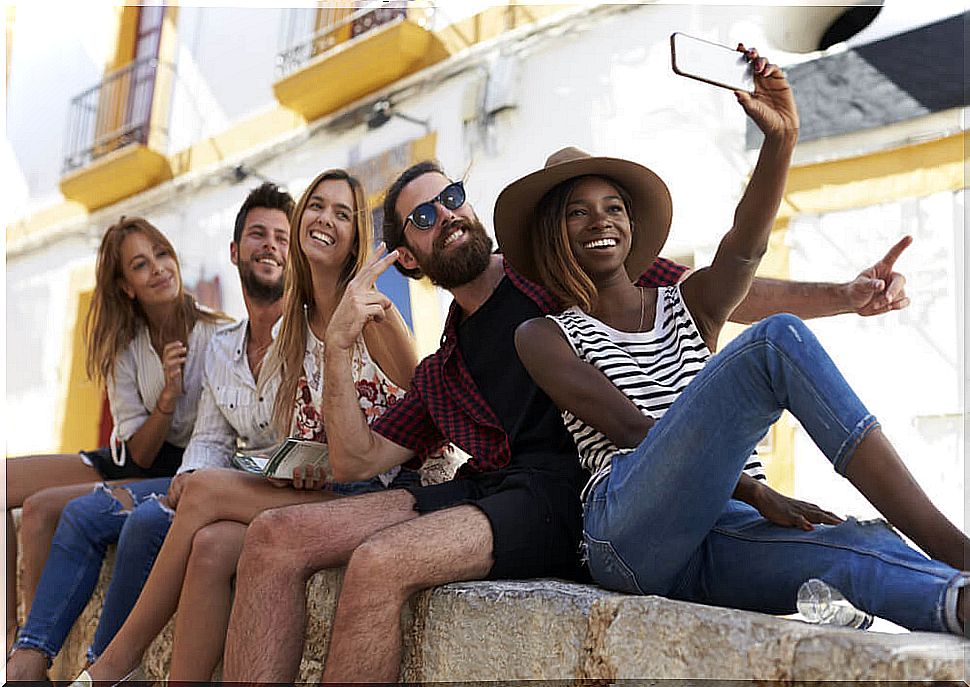 Millennials taking a selfie.