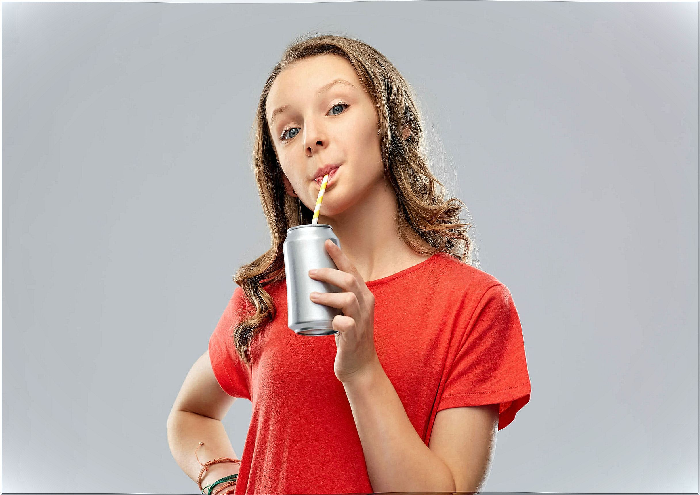 Why are soft drinks advised against in adolescents?