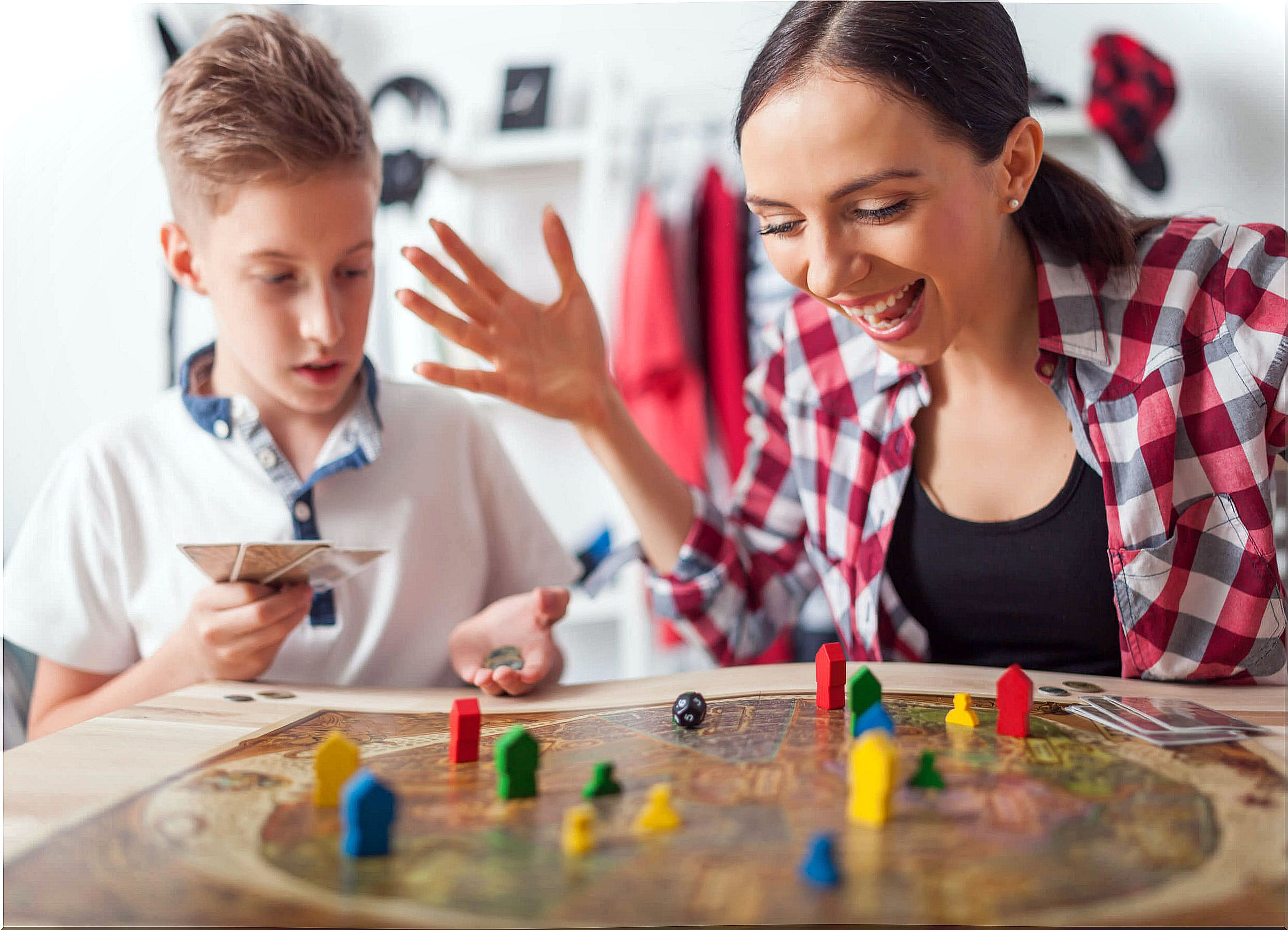 Mother and son playing collaborative games.