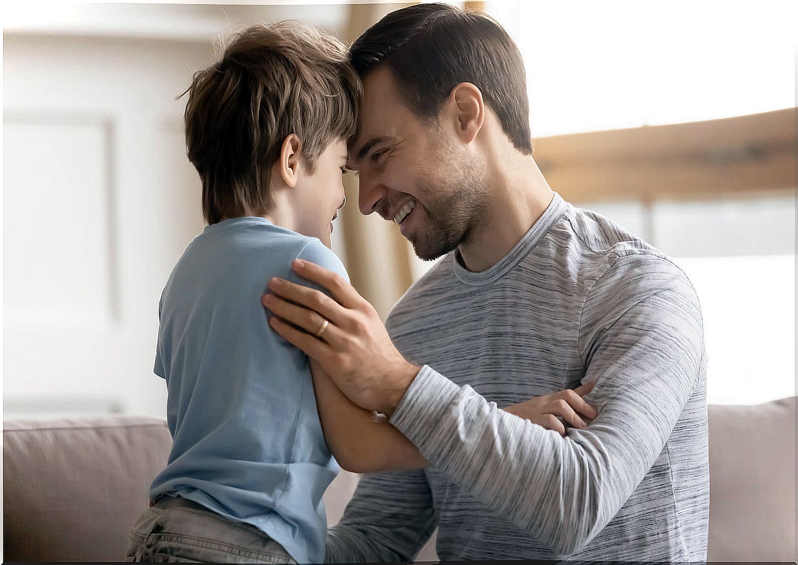 Father helping his son to get out of his comfort zone.