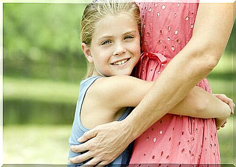 Hugs and other gestures are very good reactions to a child's good behavior.